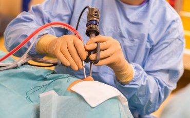 Editorial use only  
Sinus surgery. Surgeons performing functional endoscopic sinus surgery.